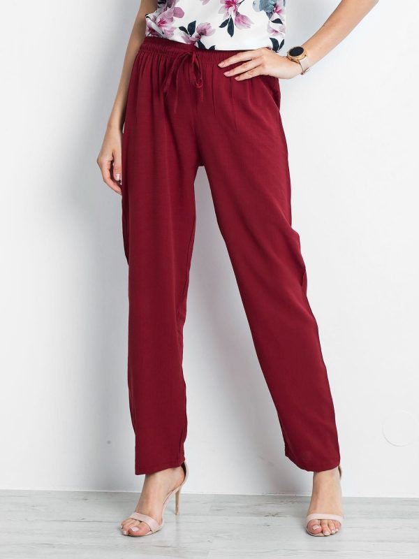 Burgundy pants Inability