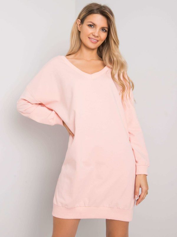 Nayla's light pink V-neck sweatshirt