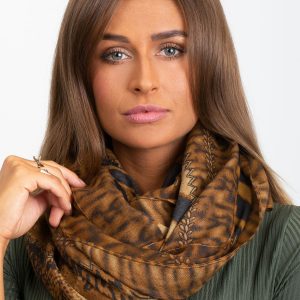 Light brown sling in animal pattern