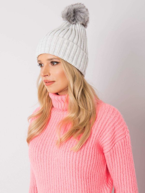 Light gray winter hat with pompom