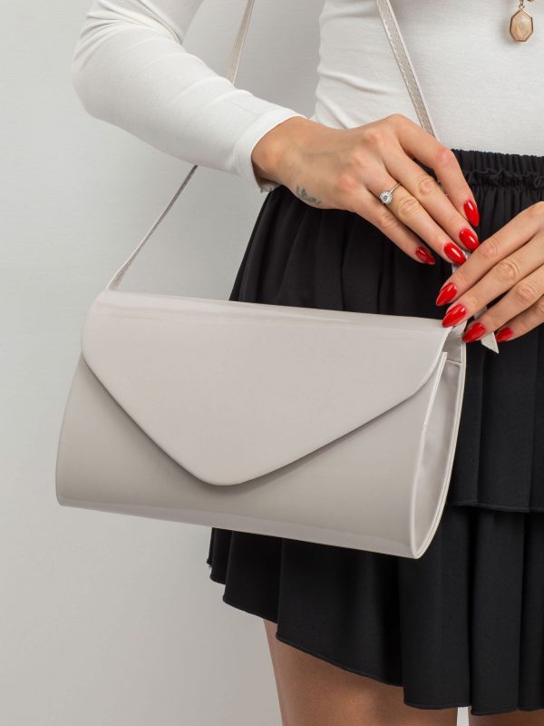 Light beige lacquered clutch bag