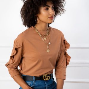 Sarah's light brown blouse