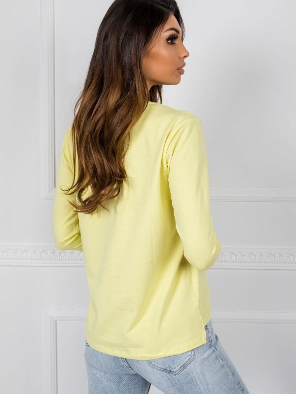 Lissie's light yellow blouse