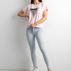 Light pink t-shirt with appliqué and cutout on the back