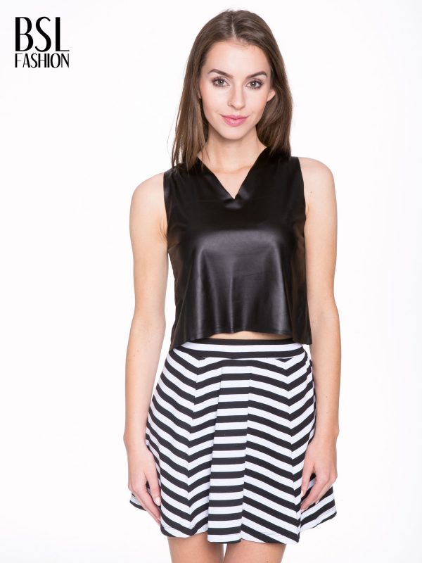 Black leather crop top in minimalist style