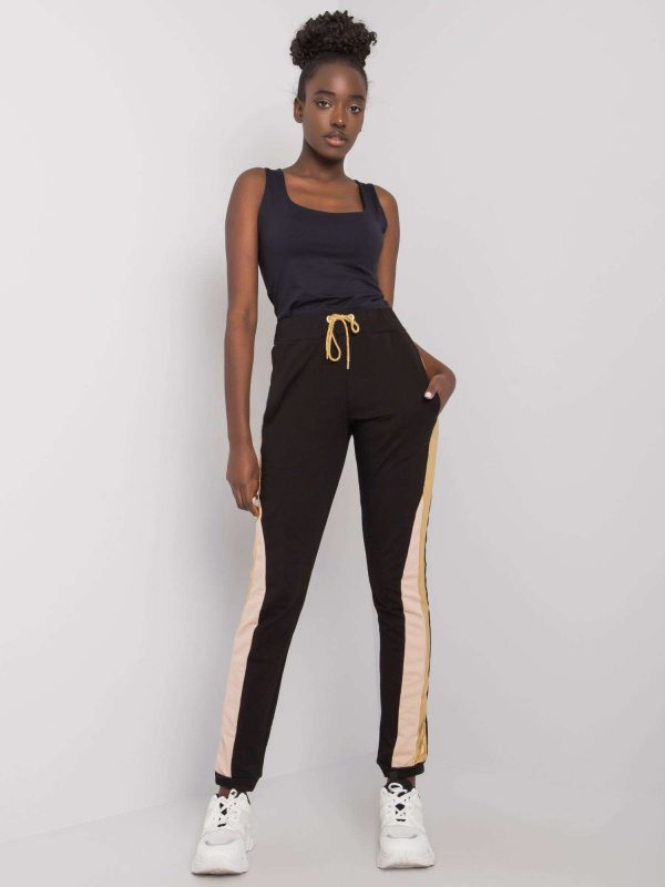 Black tracksuits with stripes by Gabrielle