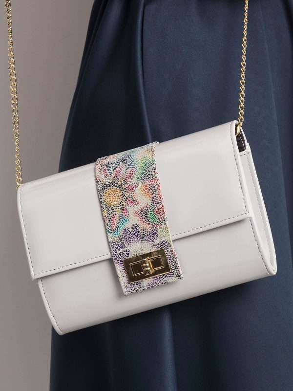 Gray clutch bag with floral motif