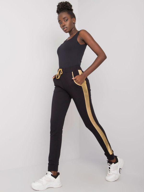 Black and gold sweatpants with Ewelyn stripe