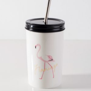 White mug with straw