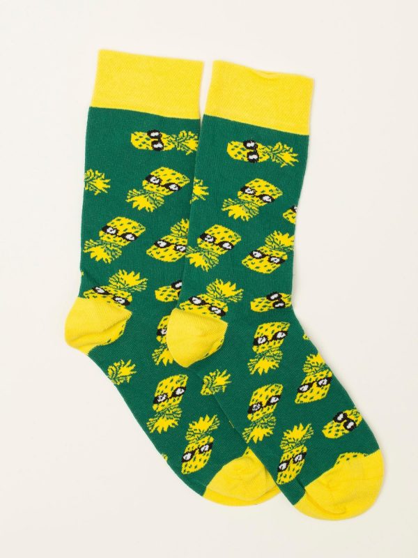 Green men's socks in pineapples