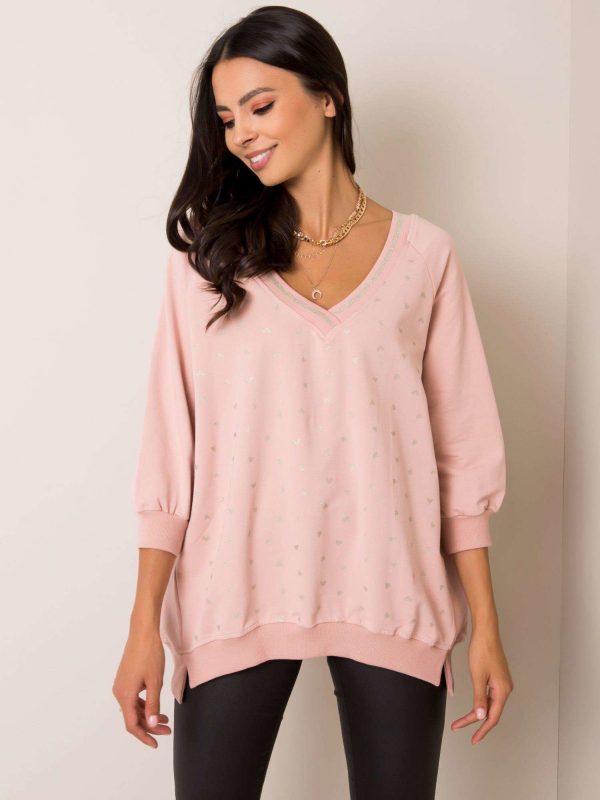 Helen's light pink sweatshirt