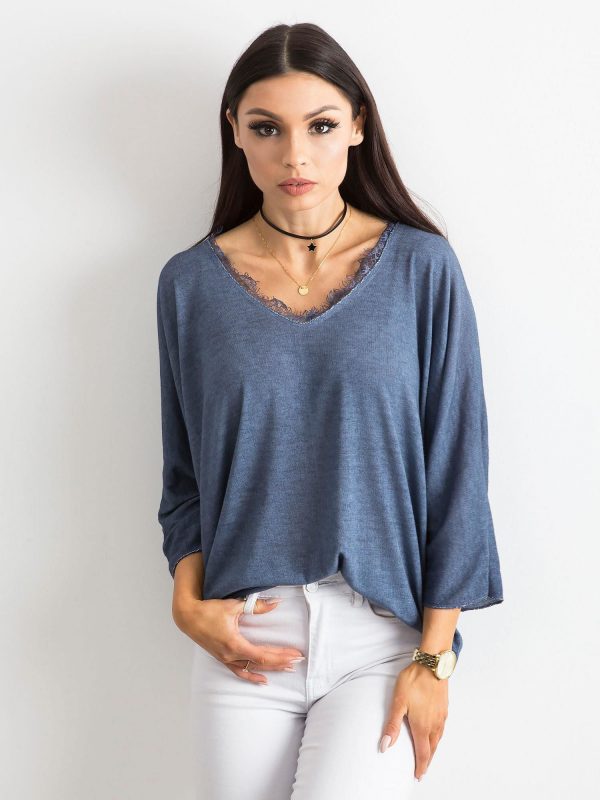 Blue blouse with lace at the neckline