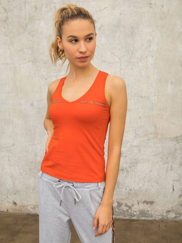 Orange sports top with rhinestones