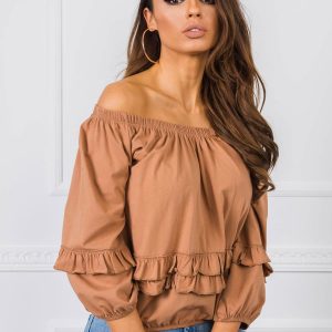 Carrie's light brown blouse