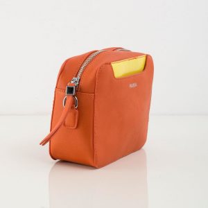 Orange eco-leather handbag with decorative handle