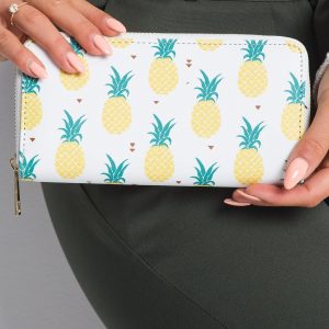 White wallet in pineapples