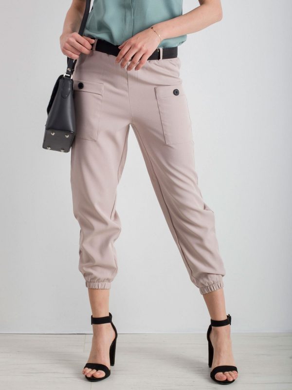 Beige trousers with welts