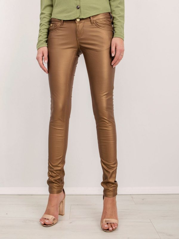 Miley's light brown pants