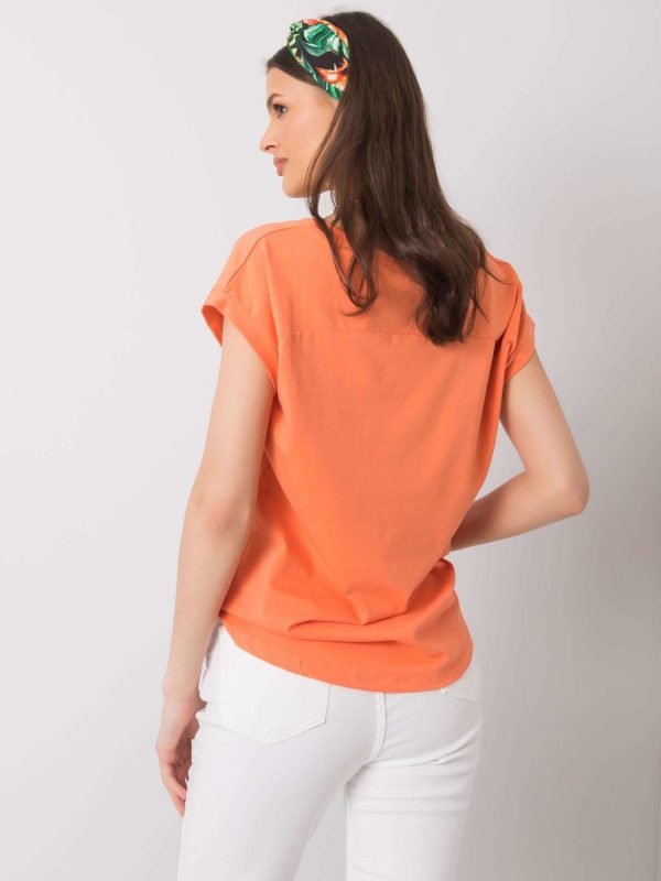 Orange T-shirt with print by Hollis