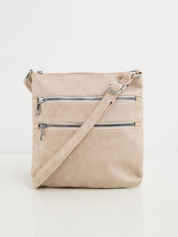 Beige handbag with zippers