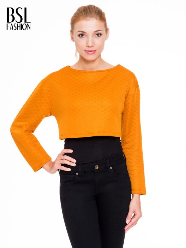 Orange quilted cropped blouse