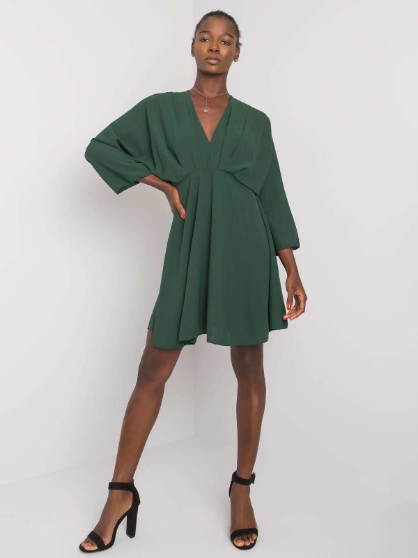 Zayn's dark green dress