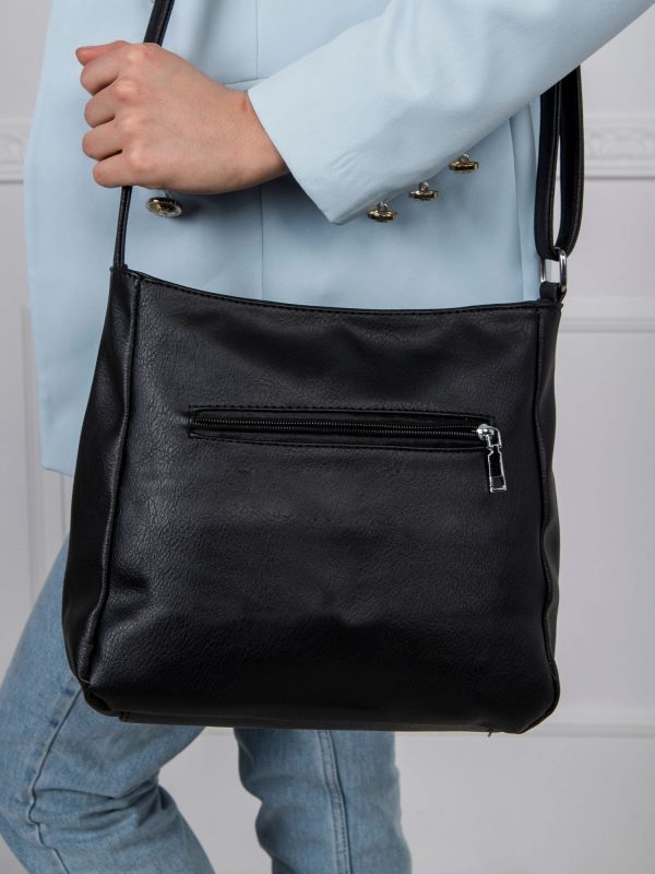 Black handbag with long strap