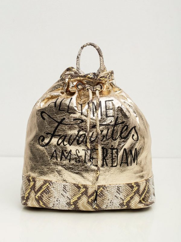 Gold backpack with inscription