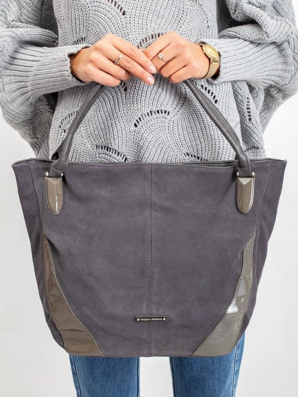 Gray bag with lacquered inserts