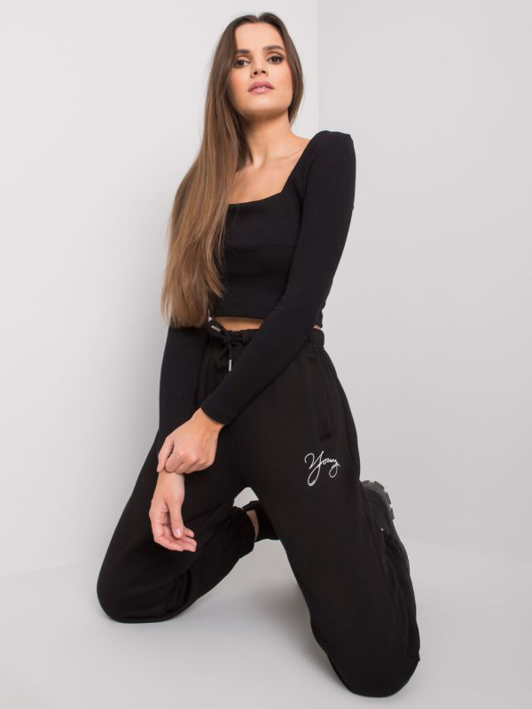 Black sweatpants with Lily inscription