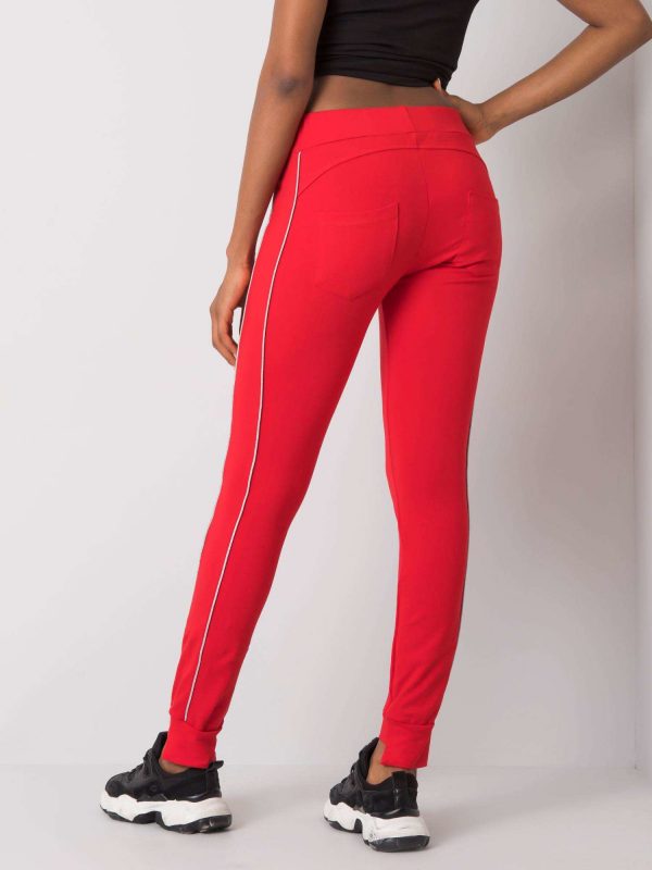 Red sweatpants with Abia appliqués