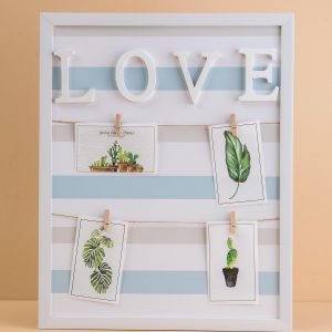 White photo frame with inscription