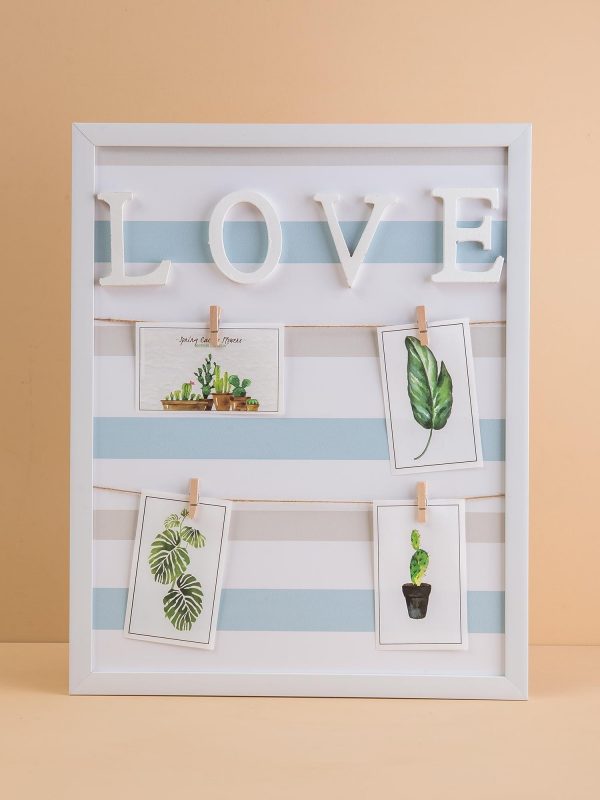 White photo frame with inscription