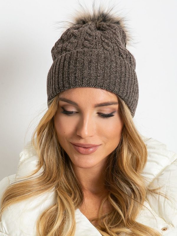 Dark brown hat with ribbing and fur pompom