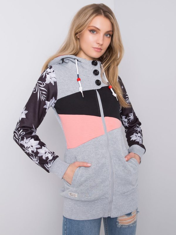 Light gray long sweatshirt with asymmetrical pattern buttons