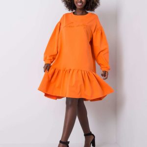 Janelle's orange flounce dress