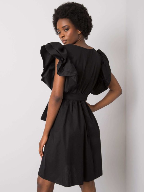 Black dress with decorative sleeves by Sheila