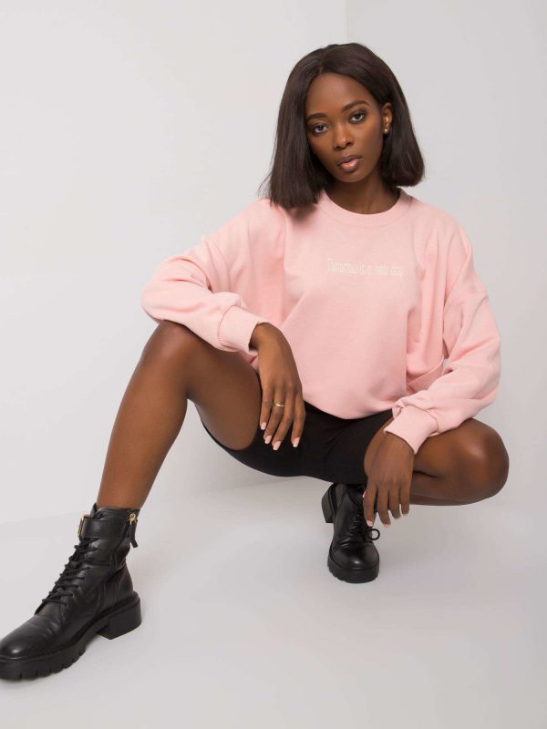 Pale pink sweatshirt with Yanett inscription