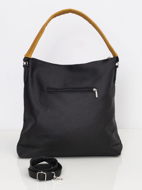 Black urban faux leather handbag