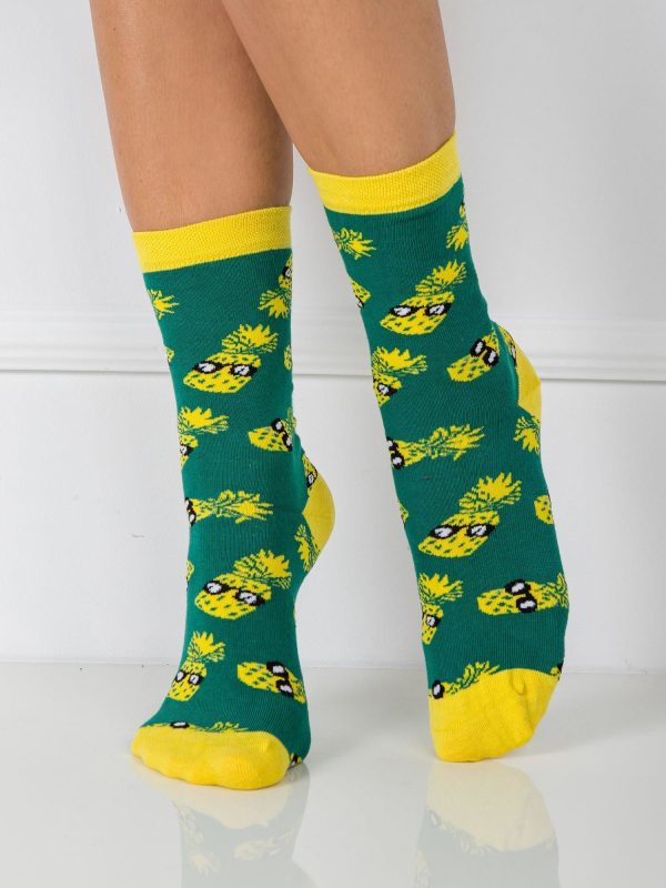 Green women's socks in pineapples