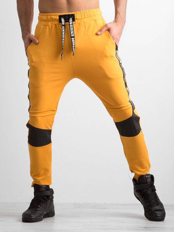 Wholesale Dark yellow men's sweatpants with inscriptions