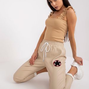 Wholesale Beige trousers made of eco-leather with Lana pockets