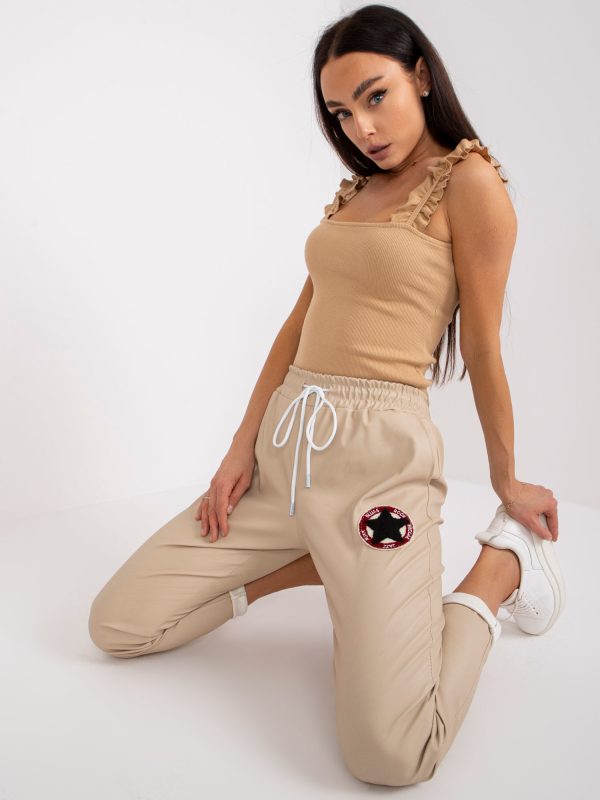 Wholesale Beige trousers made of eco-leather with Lana pockets