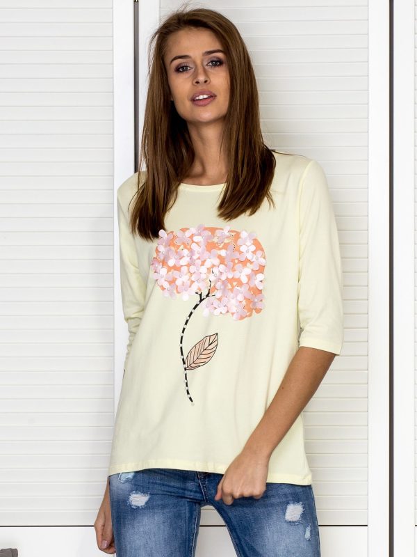 Wholesale Yellow blouse with decorative flowers and pearls