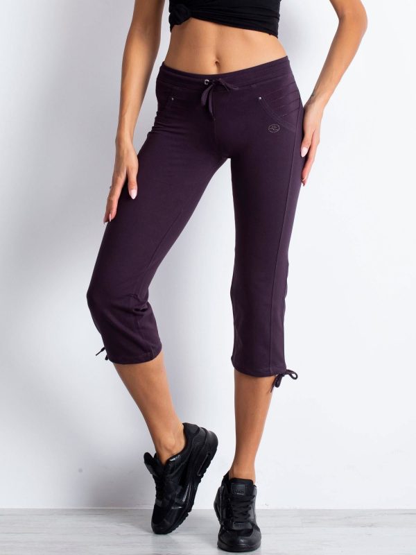 Wholesale Dark purple capri sweatpants with applique from rhinestones