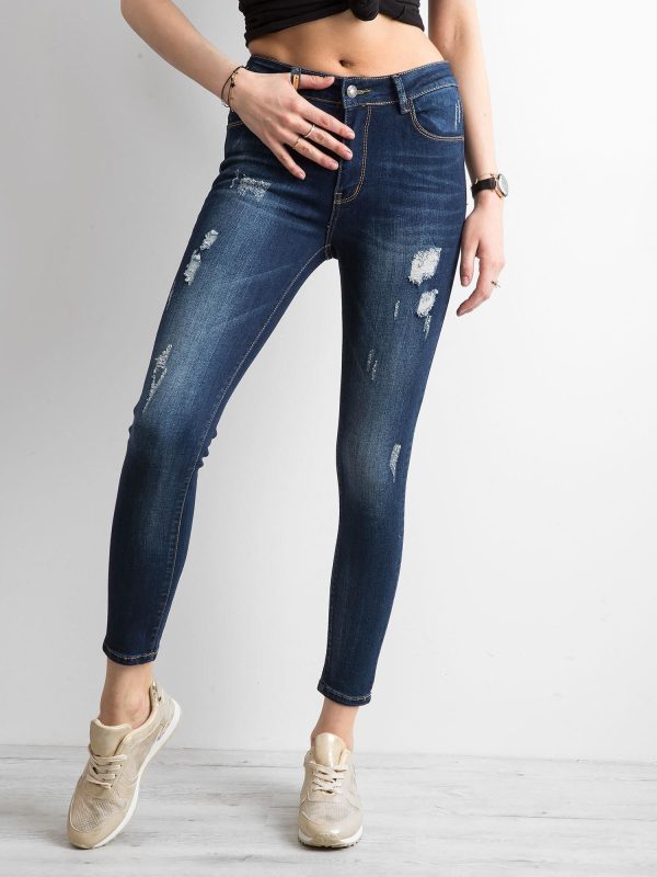 Wholesale Denim skinny pants with abrasions blue