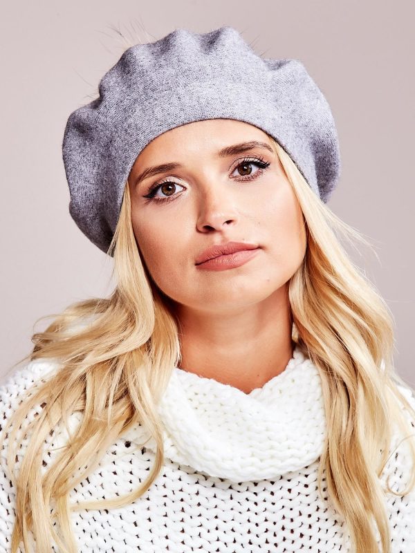 Wholesale Gray beret with fur tassel