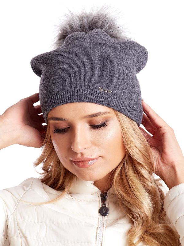 Wholesale Smooth beanie hat with tassel and ribbing dark grey