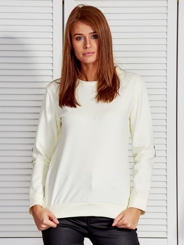 Wholesale Light yellow sweatshirt with gold neckline and cutout