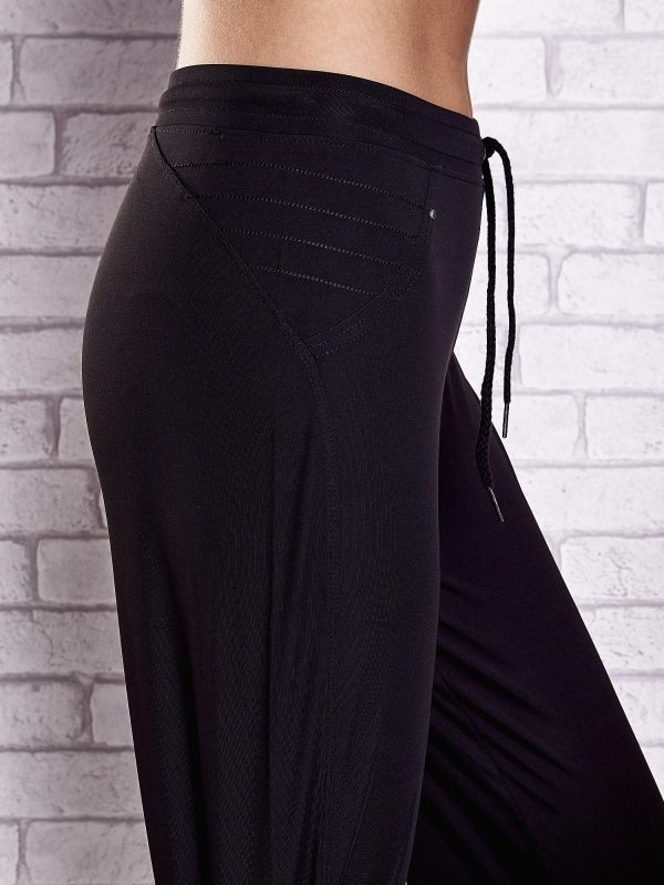 Wholesale Black sweatpants for women with embroidered inserts PLUS SIZE